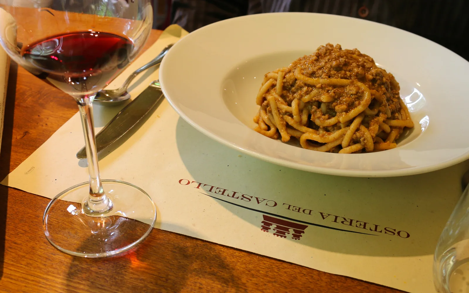 Traditional Tuscan pici pasta served with Chianti-style ragu